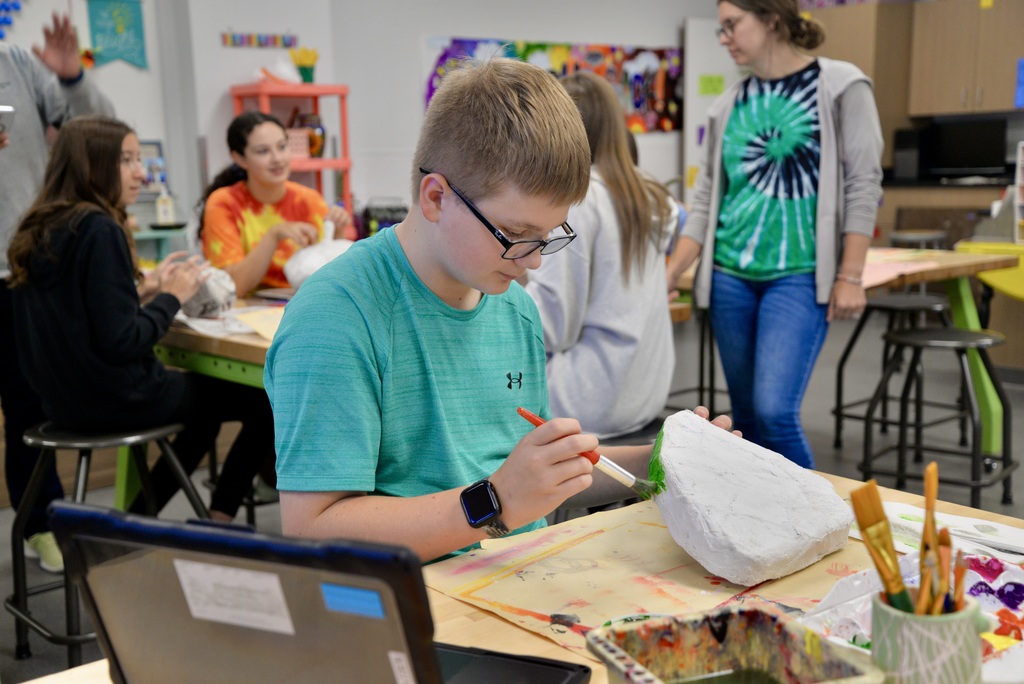fox river students painting their paper mache 